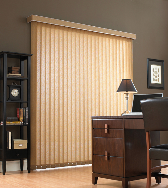 Home office with vertical blinds on a sliding door