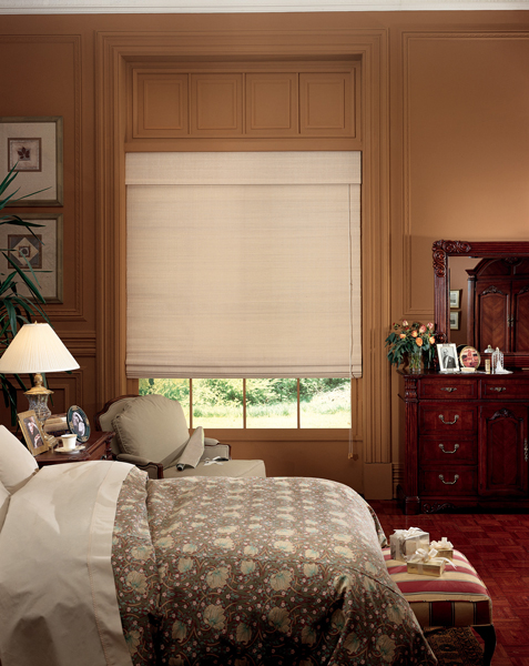 Bedroom with a fabric Roman shade