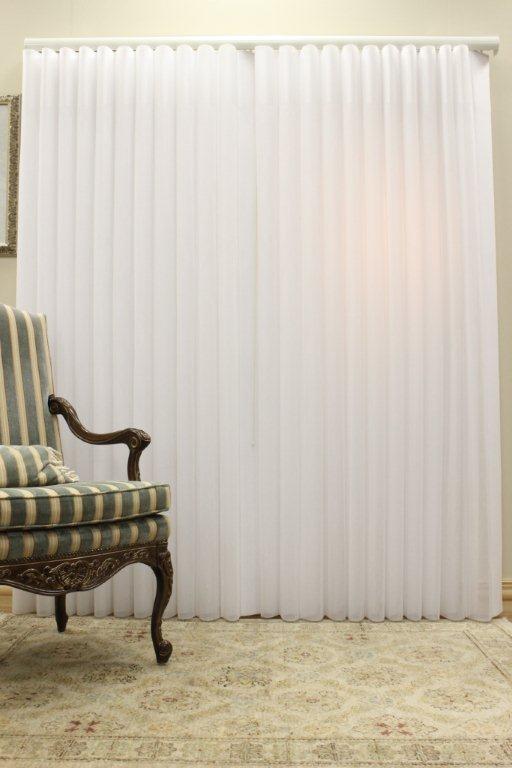 Eleganza sheer vertical shading in a living room