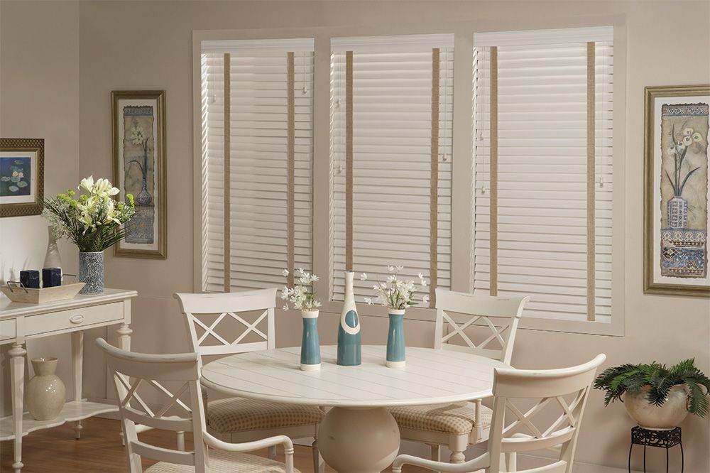 White wood blinds in a dining area